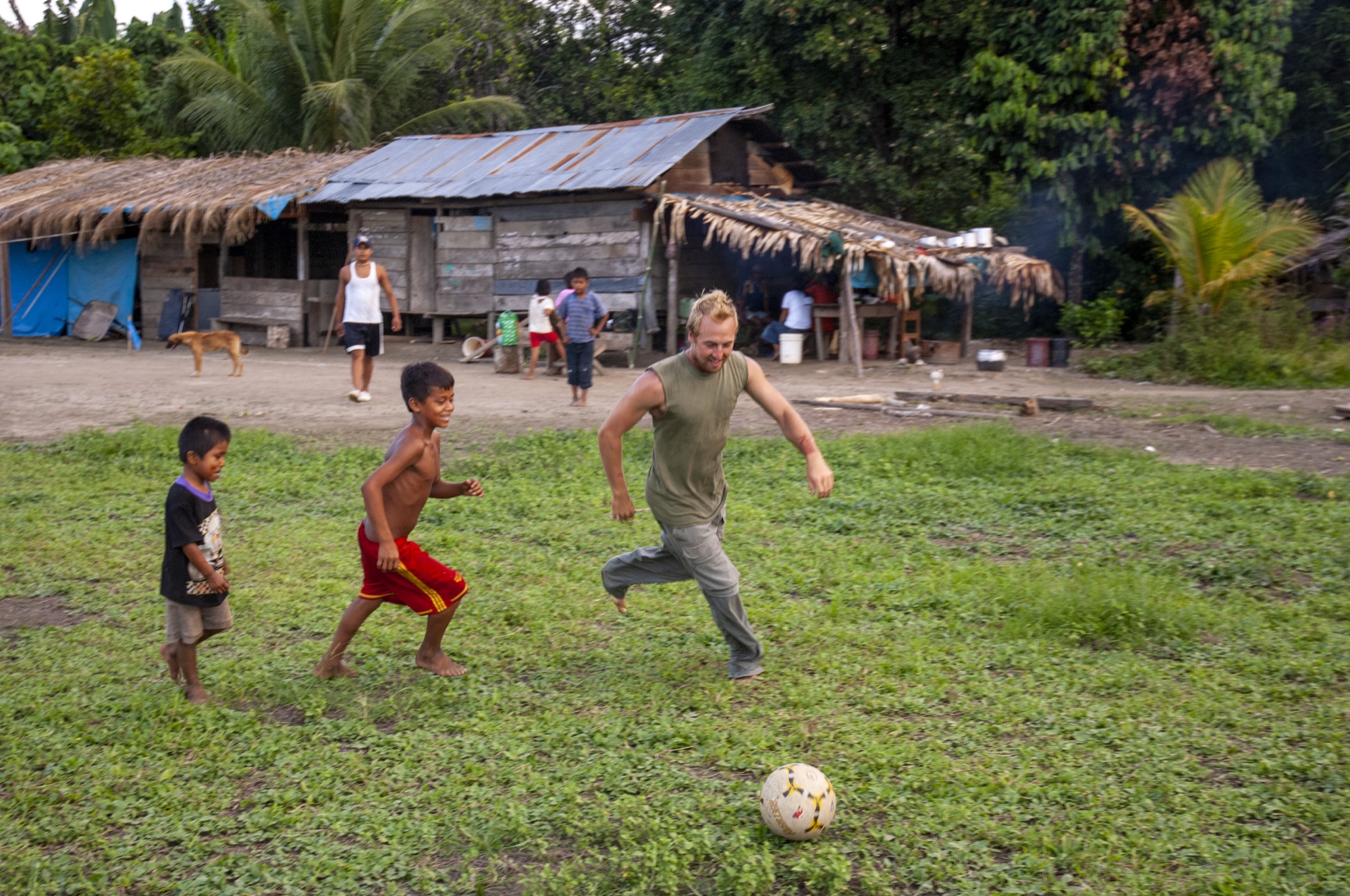An IMB missionary playing soccer with children in the Peruvian Amazon